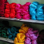 Colours_of_India_-_Silk_yarn_waiting_to_be_made_into_saris