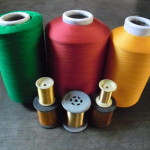 Reels of polyester thread